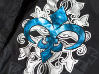 Rockový symbol lilie